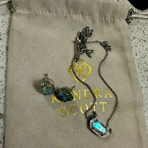 Kendra Scott set. Silver with blue tinted clear irredescent stone. Sold as a set